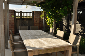 Around the barn garden with table and chairs