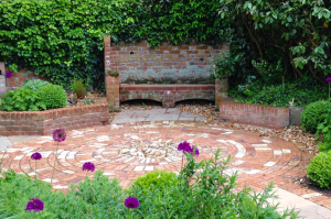 Coastal family retreat with brick bench