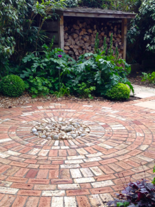 Coastal family retreat with circular brick feature